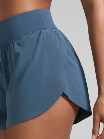 CRZ YOGA High Waisted Dolphin Athletic Running Shorts for Women 3" High Split Comfy Mesh Liner for Gym Workout Track